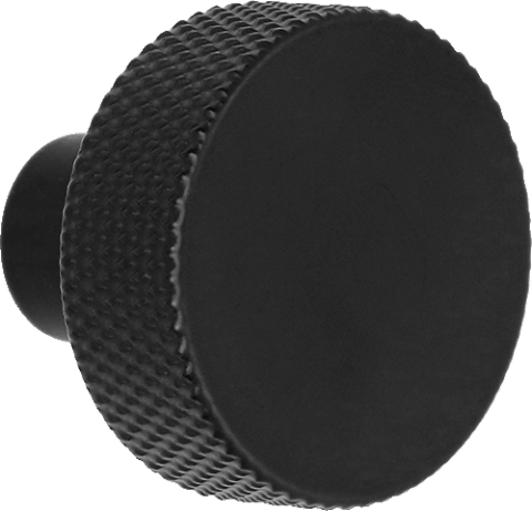 Poignée Button noire, vue de face. Diamètre : 3,5 cm, bord texturé à facettes. Disponible sur la boutique en ligne de Custoro.